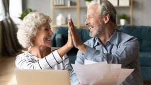 Florida Gold IRA Investing Company a happy senior couple 300x169