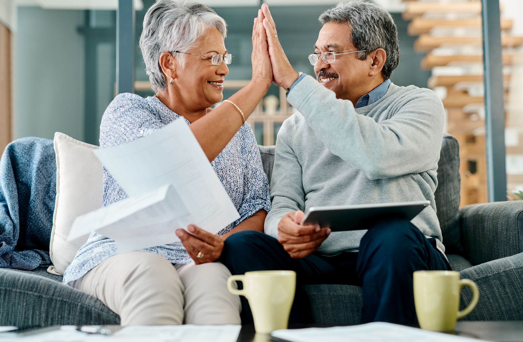 Florida Gold IRA Investing Company getty couple high five happy
